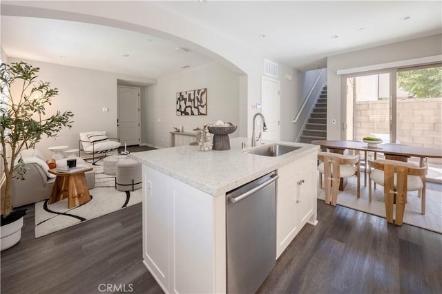 134 Milky Way, Irvine, CA 92618 - kitchen with dishwasher, dark wood-style flooring, white cabinetry, a center island with sink, and recessed lighting