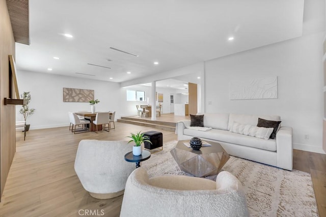 20646 Hatton St, Winnetka, CA 91306 - living room with wood finished floors and recessed lighting