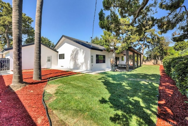 20646 Hatton St, Winnetka, CA 91306 - rear view of property with stucco siding and a patio