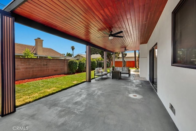 20646 Hatton St, Winnetka, CA 91306 - fenced backyard with an outdoor hangout area, a patio, and ceiling fan