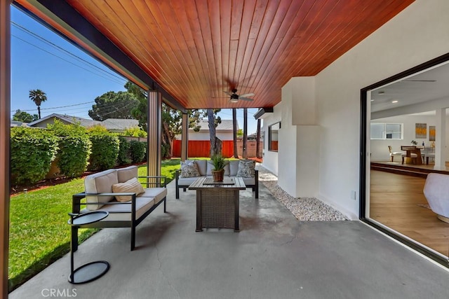 20646 Hatton St, Winnetka, CA 91306 - fenced backyard with outdoor lounge area, ceiling fan, and a patio area