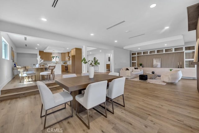 20646 Hatton St, Winnetka, CA 91306 - dining room with recessed lighting and light wood-type flooring