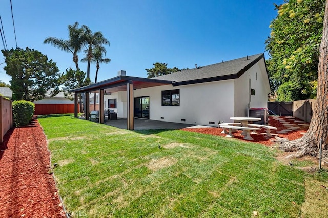 20646 Hatton St, Winnetka, CA 91306 - back of property featuring a patio, a fenced backyard, a ceiling fan, crawl space, and stucco siding
