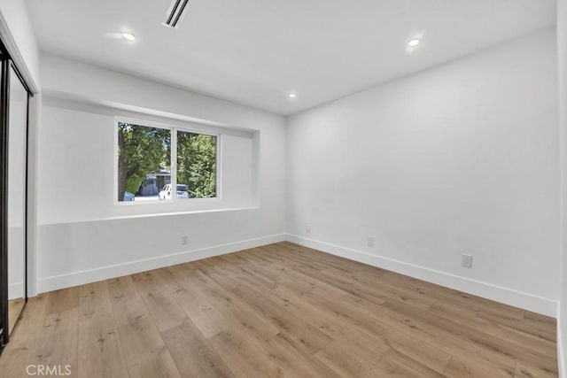 20646 Hatton St, Winnetka, CA 91306 - unfurnished room featuring light wood-style floors and recessed lighting