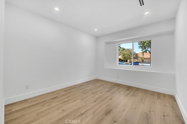 20646 Hatton St, Winnetka, CA 91306 - unfurnished room with light wood finished floors and recessed lighting