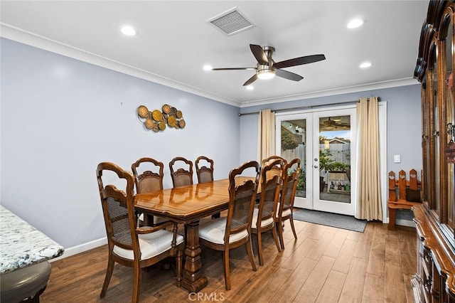 7985 Stella St, Riverside, CA 92504 - dining room featuring french doors, crown molding, wood finished floors, ceiling fan, and recessed lighting