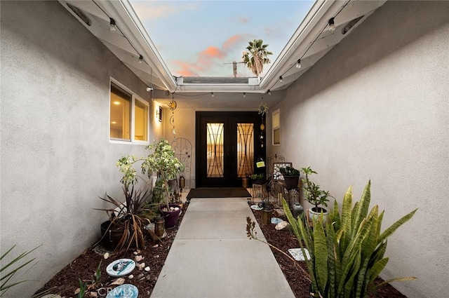 7985 Stella St, Riverside, CA 92504 - entrance to property with stucco siding and french doors