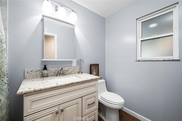 7985 Stella St, Riverside, CA 92504 - bathroom featuring vanity and wood finished floors