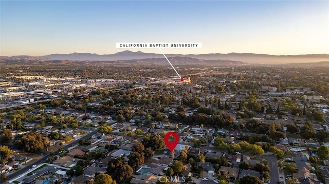 7985 Stella St, Riverside, CA 92504 - aerial view of property and surrounding area with a mountainous background