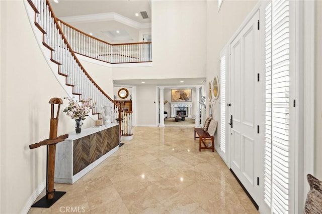 2786 E California Blvd, Pasadena, CA 91107 - entryway featuring a high ceiling, stairs, ornamental molding, and recessed lighting