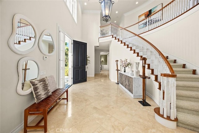 2786 E California Blvd, Pasadena, CA 91107 - entryway featuring stairs, ornamental molding, a high ceiling, recessed lighting, and a chandelier