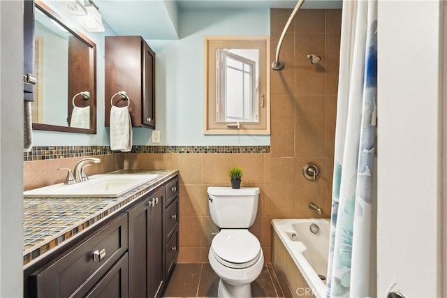 6557 Clybourn Ave, North Hollywood, CA 91606 - full bath with tile walls, vanity, and tiled shower / bath combo