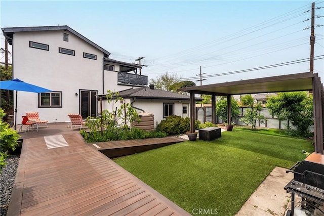 6557 Clybourn Ave, North Hollywood, CA 91606 - back of property featuring a balcony, stucco siding, and a deck