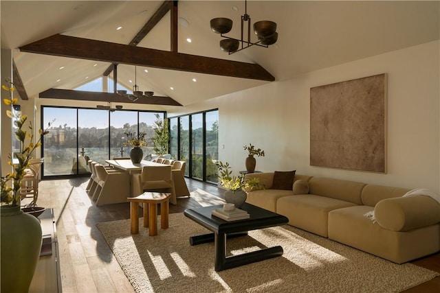 3733 Northland Dr, View Park, CA 90008 - living room featuring a chandelier, beam ceiling, wood finished floors, recessed lighting, and high vaulted ceiling