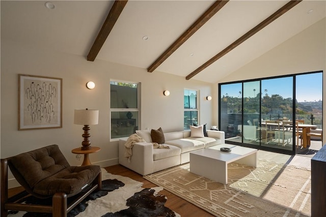 3733 Northland Dr, View Park, CA 90008 - living room with light wood-style flooring, beamed ceiling, and high vaulted ceiling