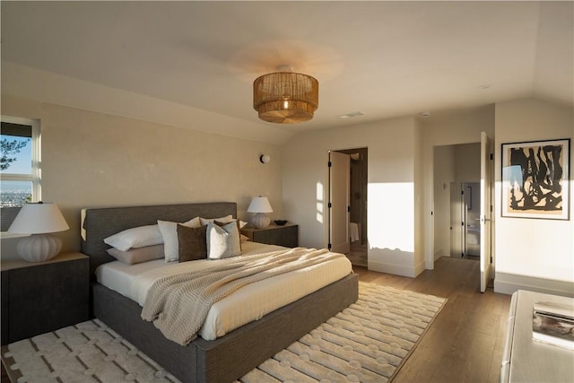 3733 Northland Dr, View Park, CA 90008 - bedroom featuring light wood-type flooring and lofted ceiling