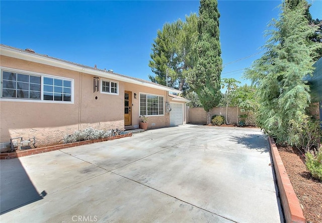 5221 Farago Ave, Temple City, CA 91780 - view of patio with an attached garage and driveway
