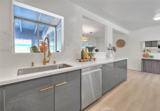 5221 Farago Ave, Temple City, CA 91780 - kitchen with gray cabinets, dishwasher, light wood-style floors, and light stone counters