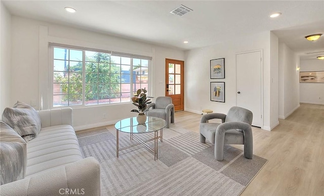 5221 Farago Ave, Temple City, CA 91780 - living area with healthy amount of natural light, light wood-style flooring, and recessed lighting