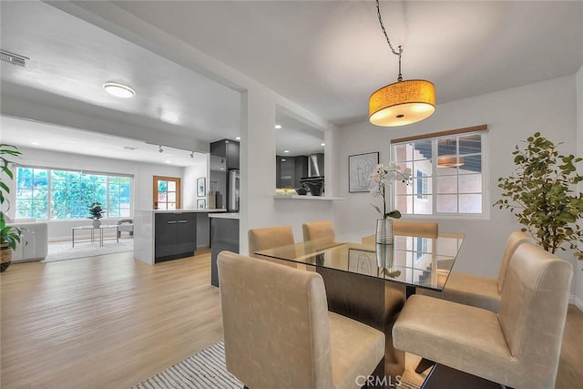 5221 Farago Ave, Temple City, CA 91780 - dining area featuring light wood finished floors and baseboards