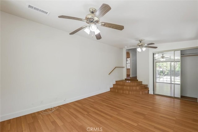 164 S Berkeley Ave, Pasadena, CA 91107 - empty room featuring stairs, light wood finished floors, and ceiling fan