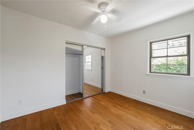 164 S Berkeley Ave, Pasadena, CA 91107 - unfurnished bedroom with light wood-style flooring, a closet, and ceiling fan