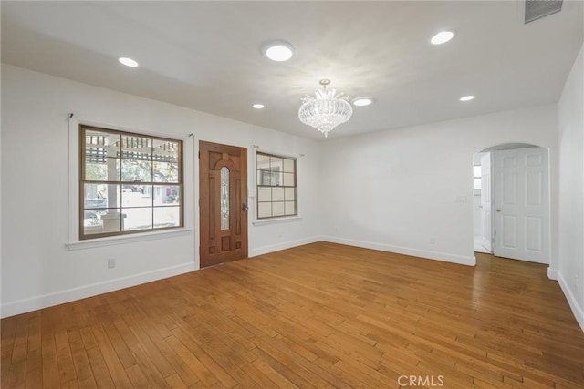 164 S Berkeley Ave, Pasadena, CA 91107 - entryway featuring arched walkways, a chandelier, hardwood / wood-style flooring, and recessed lighting