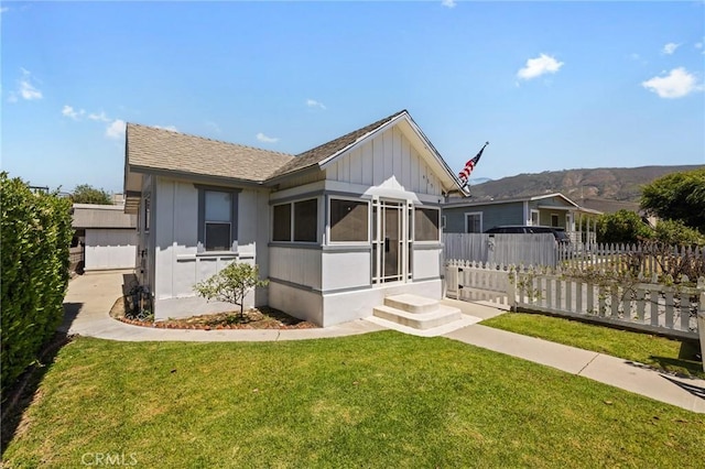 435 S Palm Ave, Santa Paula, CA 93060 - view of front of house featuring board and batten siding and a sunroom
