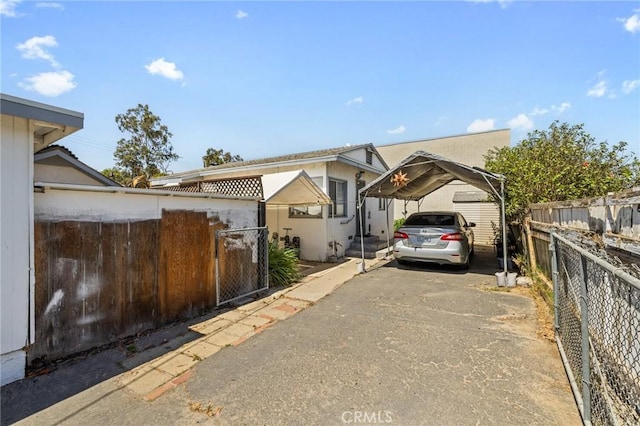 435 S Palm Ave, Santa Paula, CA 93060 - view of front of property with a carport and asphalt driveway