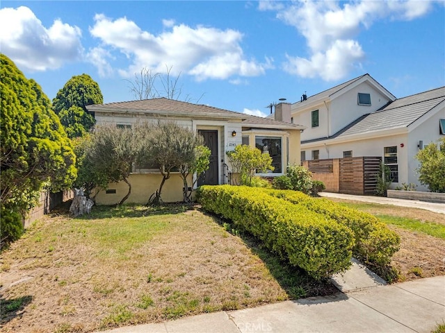 2345 22nd St, Santa Monica, CA 90405 - view of front facade with a chimney and stucco siding