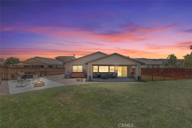 29184 Tree House, Lake Elsinore, CA 92530 - rear view of property with an outdoor fire pit, a patio, a fenced backyard, and stucco siding