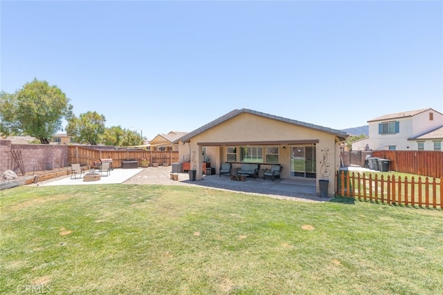 29184 Tree House, Lake Elsinore, CA 92530 - rear view of property with an outdoor fire pit, a patio area, a fenced backyard, and stucco siding