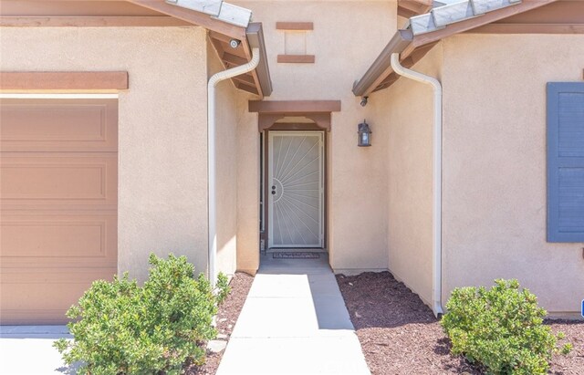 29184 Tree House, Lake Elsinore, CA 92530 - doorway to property featuring stucco siding