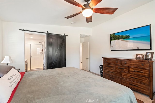 29184 Tree House, Lake Elsinore, CA 92530 - bedroom with a barn door, ceiling fan, connected bathroom, and carpet