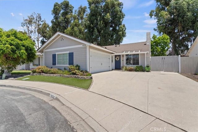 4332 Fairbrook Ln, Moorpark, CA 93021 - single story home featuring an attached garage, concrete driveway, and a chimney