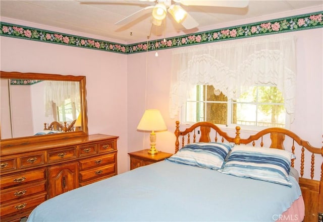 46424 Baldpate Ln, Squaw Valley, CA 93675 - bedroom featuring multiple windows, ornamental molding, and a ceiling fan