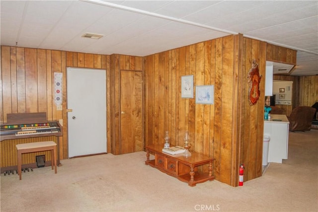 46424 Baldpate Ln, Squaw Valley, CA 93675 - hallway with carpet flooring and wooden walls
