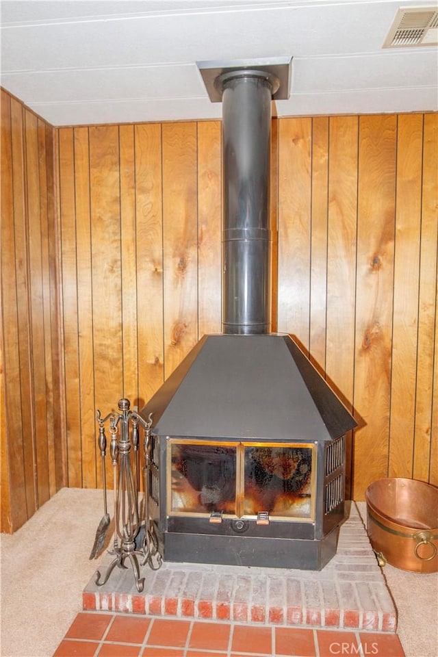 46424 Baldpate Ln, Squaw Valley, CA 93675 - detailed view of wood walls, carpet floors, and a wood stove