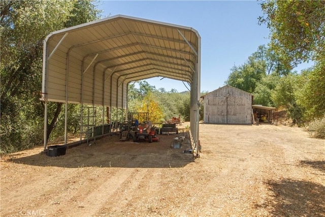 46424 Baldpate Ln, Squaw Valley, CA 93675 - view of parking / parking lot with a detached carport and dirt driveway
