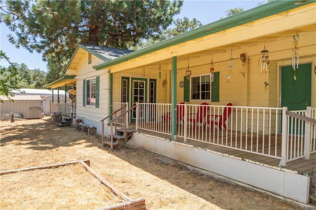46424 Baldpate Ln, Squaw Valley, CA 93675 - view of front of house featuring a porch and a storage unit