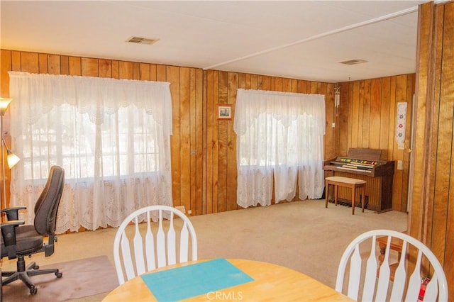 46424 Baldpate Ln, Squaw Valley, CA 93675 - dining room with carpet floors and wooden walls