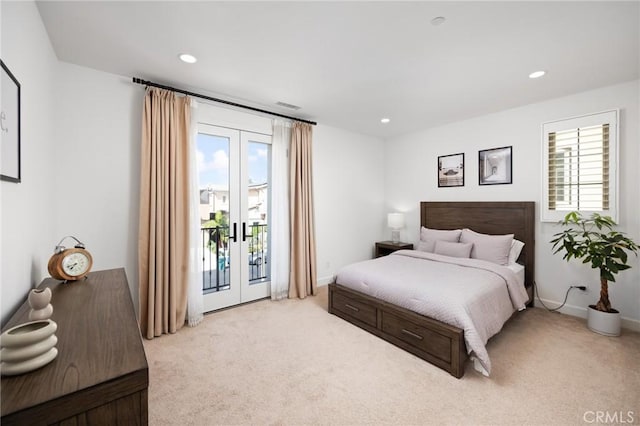 138 Jayhawk, Irvine, CA 92602 - bedroom with french doors, access to outside, light carpet, multiple windows, and recessed lighting