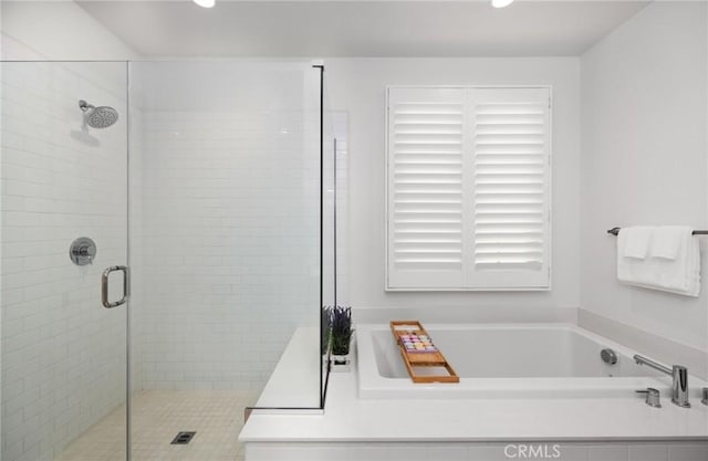 138 Jayhawk, Irvine, CA 92602 - full bath with a stall shower, a bath, and recessed lighting