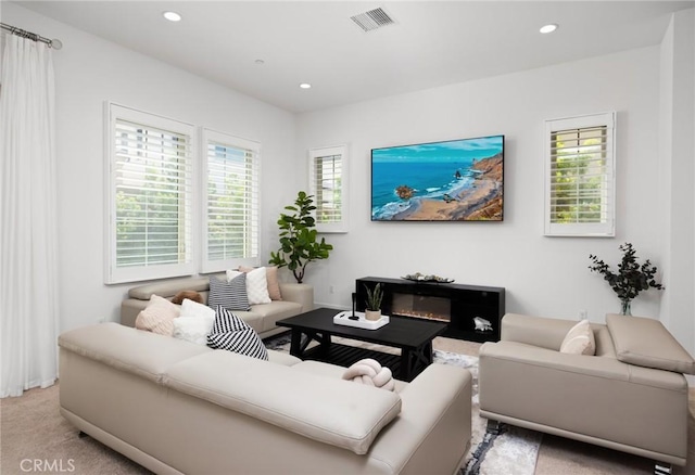 138 Jayhawk, Irvine, CA 92602 - living area with healthy amount of natural light, recessed lighting, and light colored carpet
