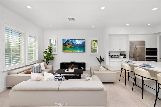 138 Jayhawk, Irvine, CA 92602 - living area featuring healthy amount of natural light and recessed lighting