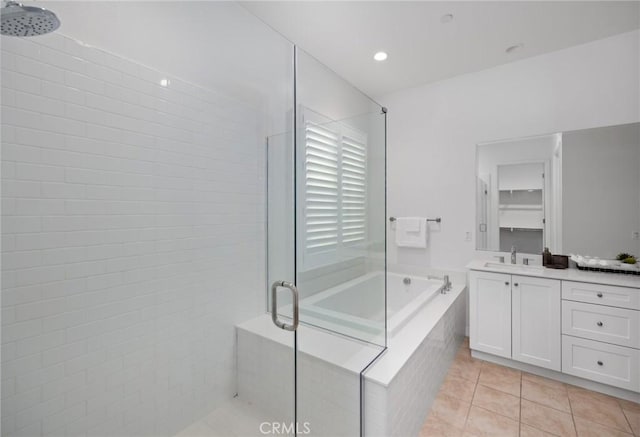 138 Jayhawk, Irvine, CA 92602 - full bathroom with a stall shower, vanity, tile patterned flooring, and a garden tub