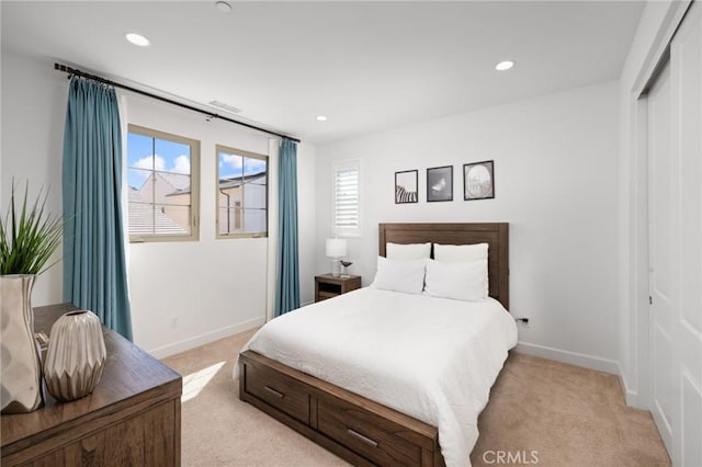 138 Jayhawk, Irvine, CA 92602 - bedroom with light carpet, multiple windows, a closet, and recessed lighting