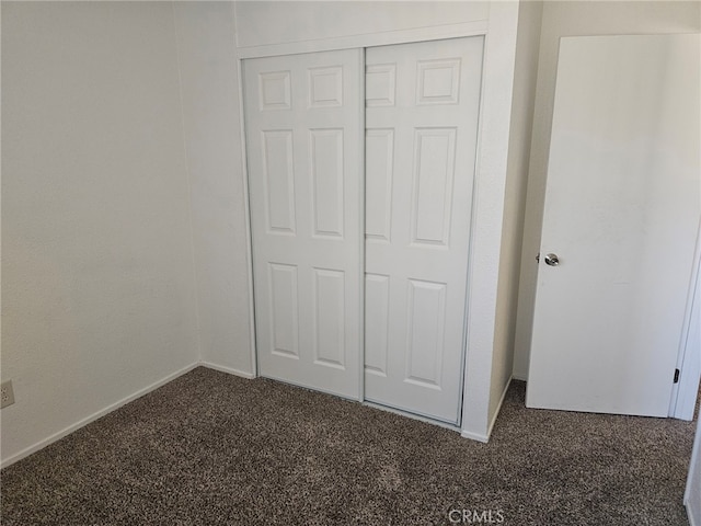 7941 Midhurst Dr, Highland, CA 92346 - unfurnished bedroom featuring carpet flooring and a closet