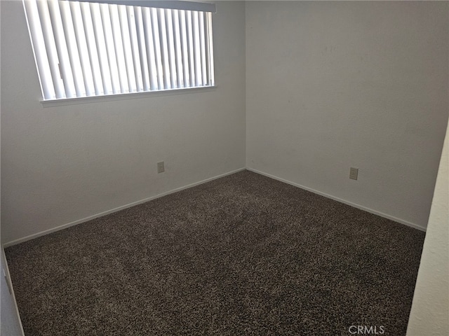 7941 Midhurst Dr, Highland, CA 92346 - empty room featuring carpet floors and baseboards