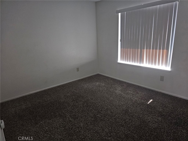 7941 Midhurst Dr, Highland, CA 92346 - carpeted spare room featuring baseboards